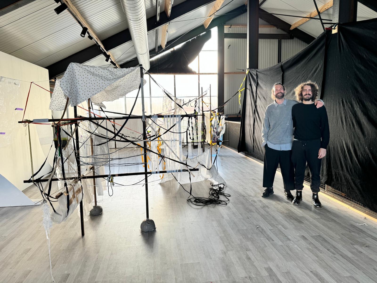 Vico Persson and Lorenzo Servali beside the hanging installation at The Treehouse